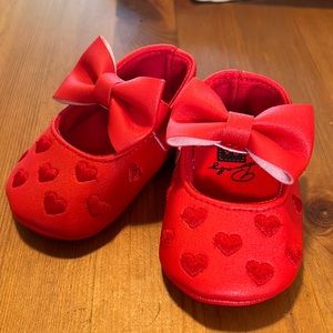 Red baby shoes
